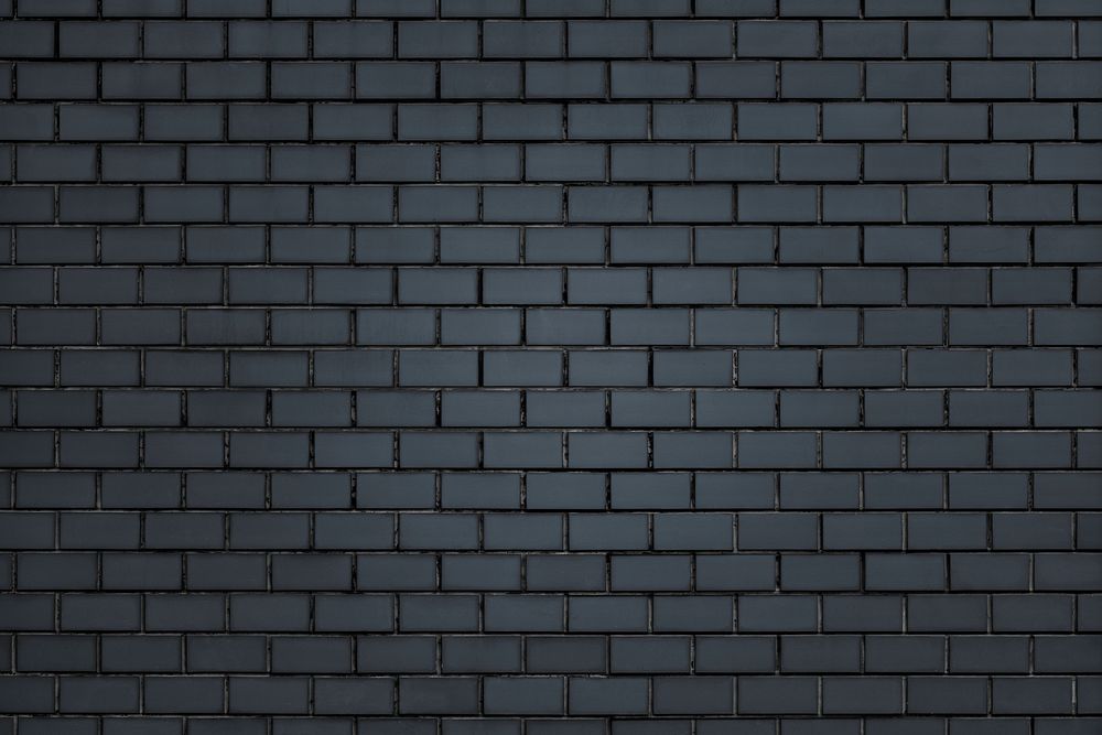 Dark gray brick wall textured background