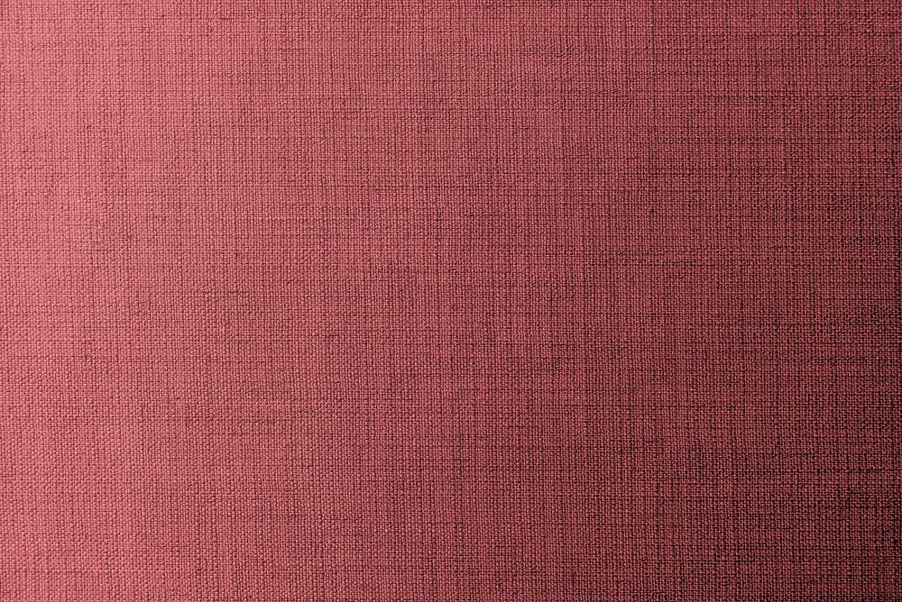 Plain deep pink fabric textured background