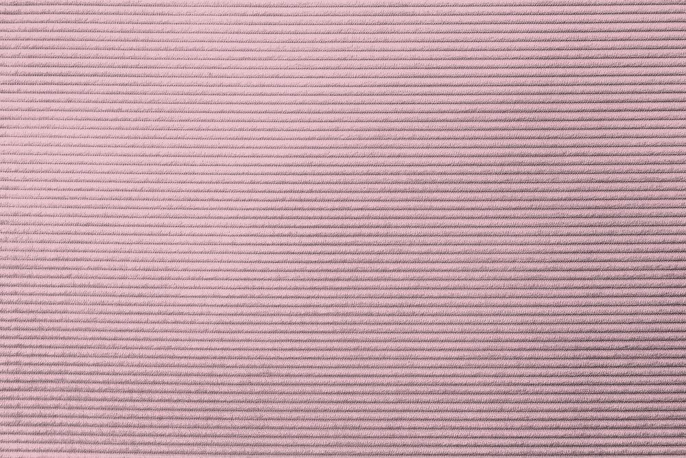 Pink corduroy fabric textured background