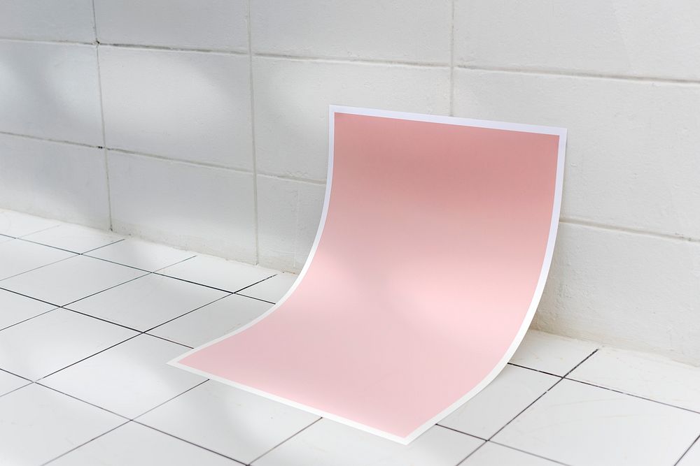 Pink poster on ceramic tile floor