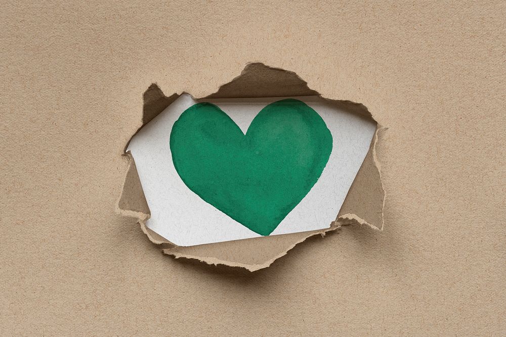 Green heart psd inside eco-friendly torn kraft paperboard