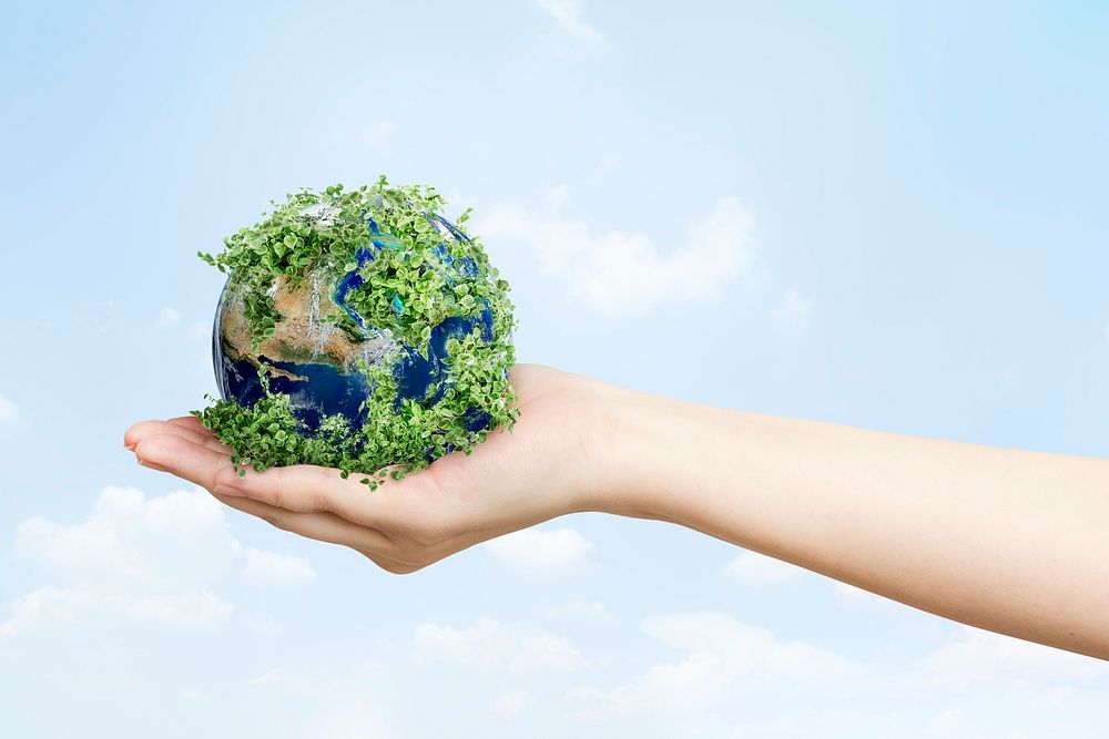Sustainable living environmentalist hand psd holding green earth