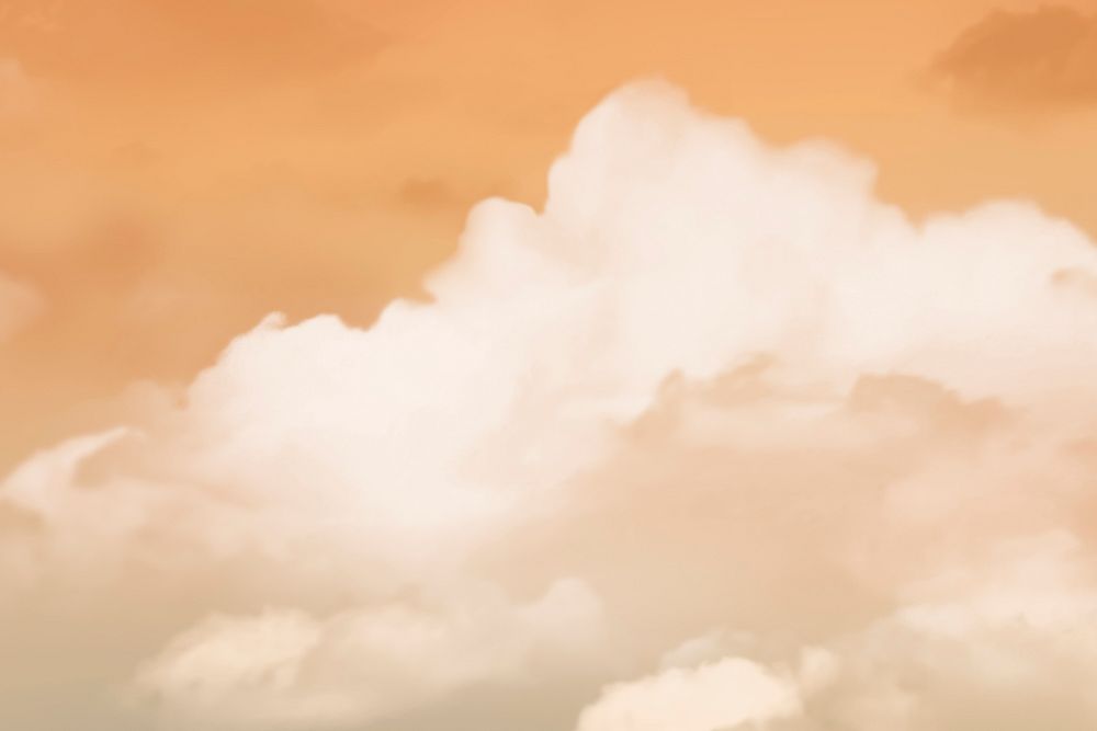 Orange sky with clouds background