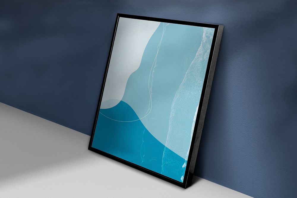 Black picture frame mockup psd leaning against the wall