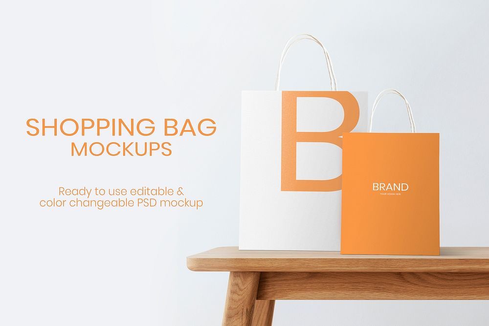 Paper bags mockup psd for shopping and branding on a wooden table