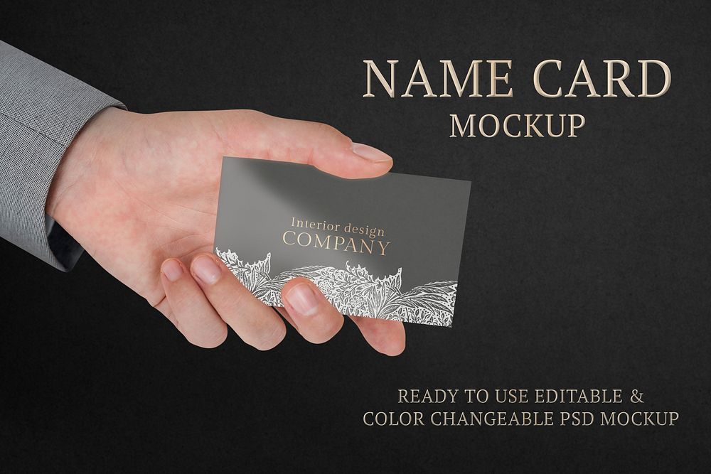 Floral business card mockup psd with businessman&rsquo;s hand