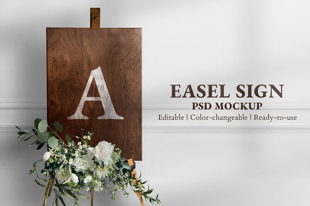 Wedding easel sign mockup psd in wooden texture with flowers
