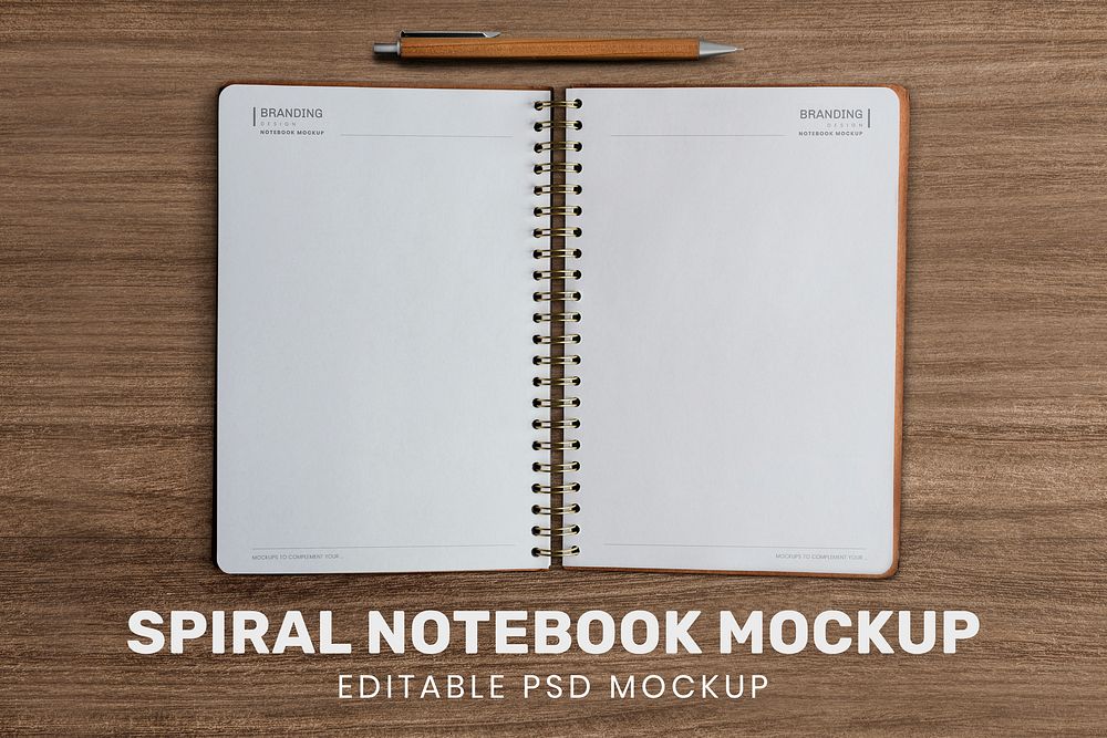 Opened notebook pages mockup psd on wooden background