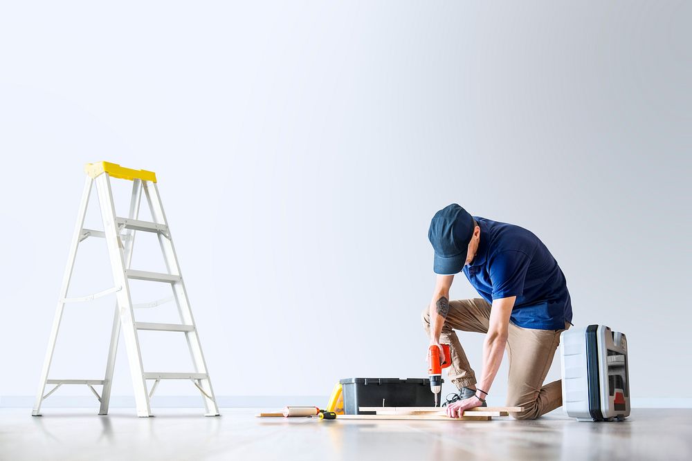 Wall mockup psd with man renovating the house