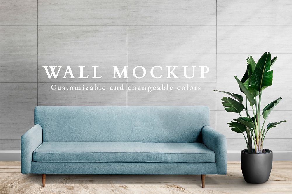 Wall mockup psd with blue sofa in living room