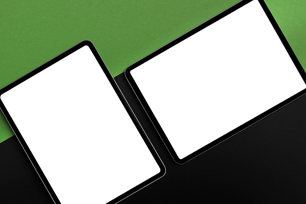 Blank tablet ​​​​​on green background