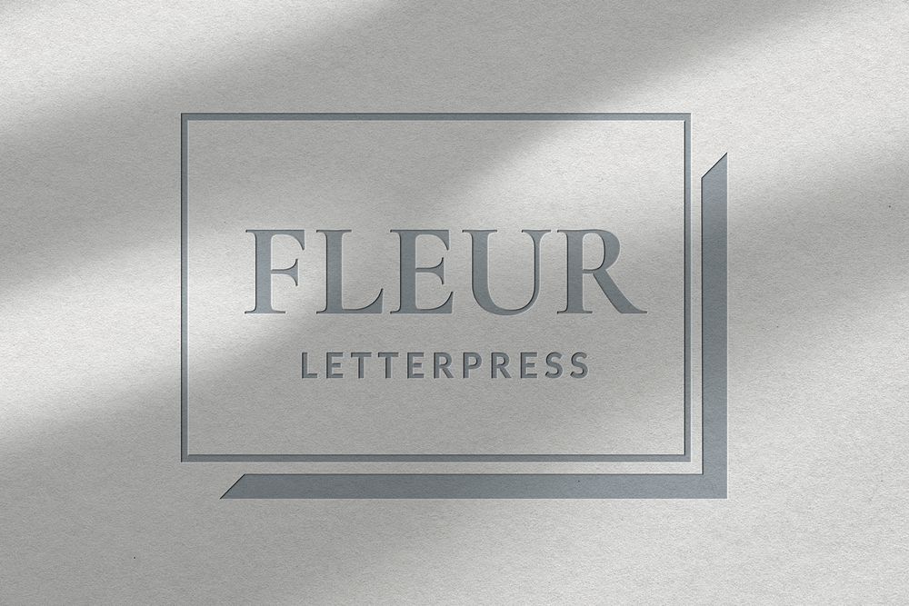 Letterpress studio business logo psd template in debossed paper texture