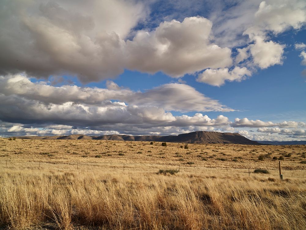 A distant butte near Truxton, along old U.S. Highway 66 in Mohave County, Arizona. Original image from Carol M.…