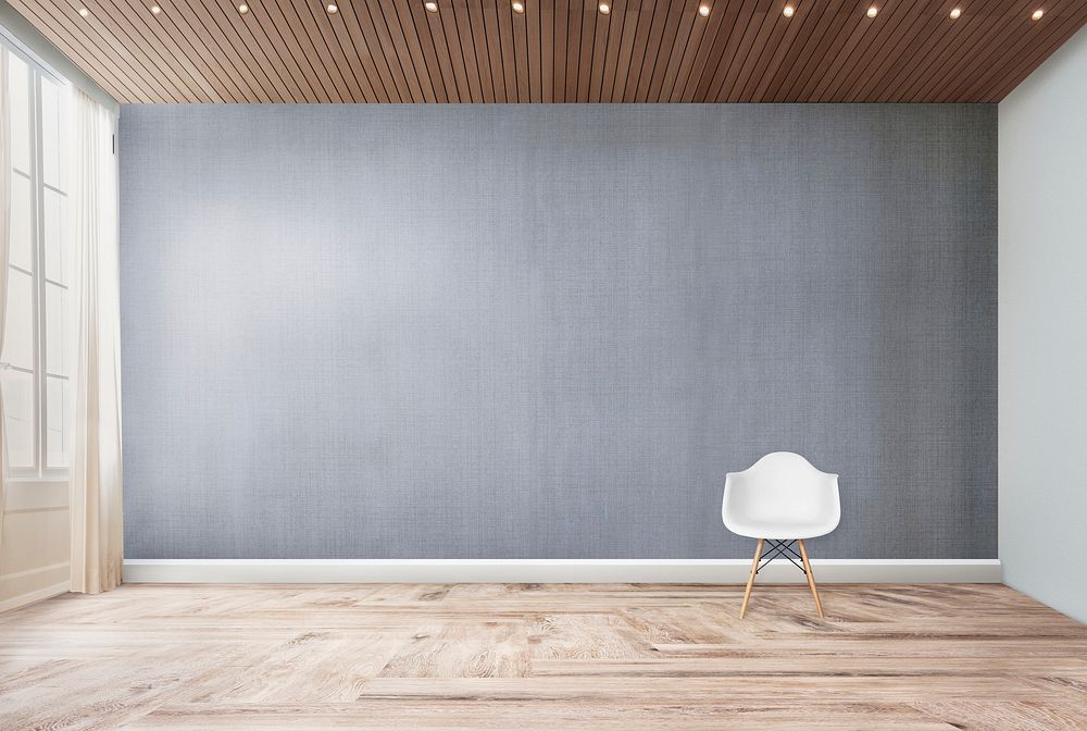 White chair against a gray wall mockup