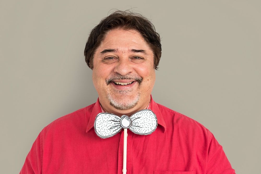Portrait of a man with a paper bowtie