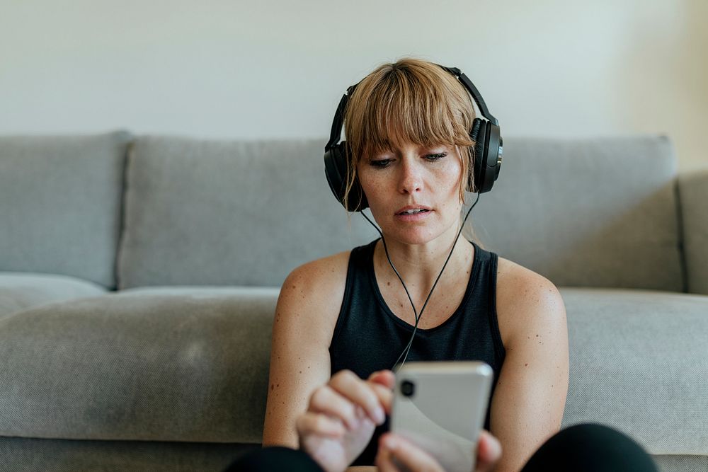 Woman listening to music during coronavirus quarantine