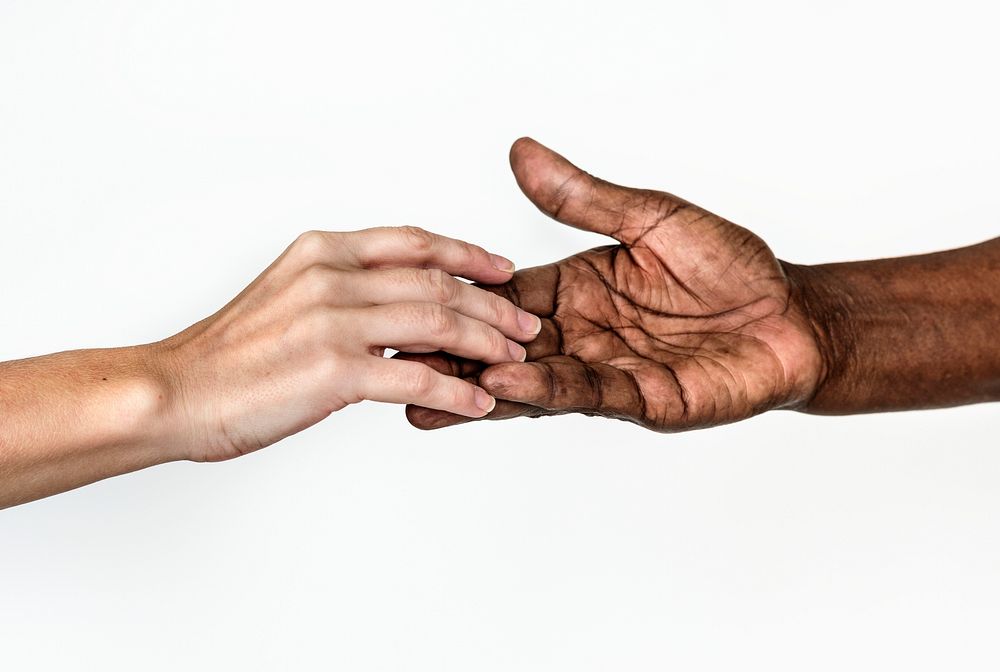 Diverse hands holding each other