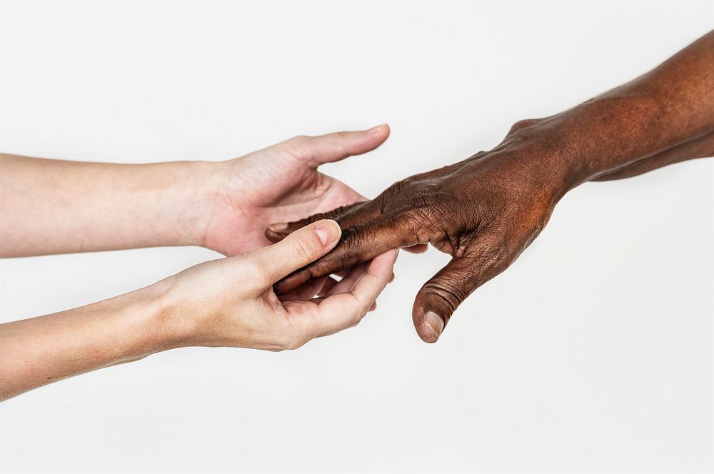 Diverse hands holding each other