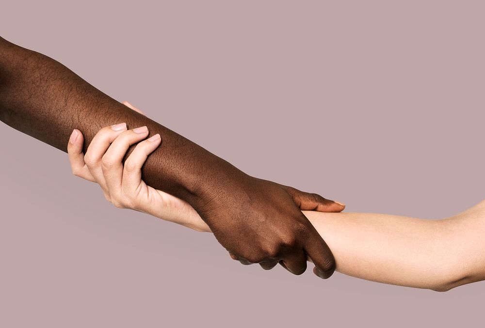 Diverse hands holding and support other