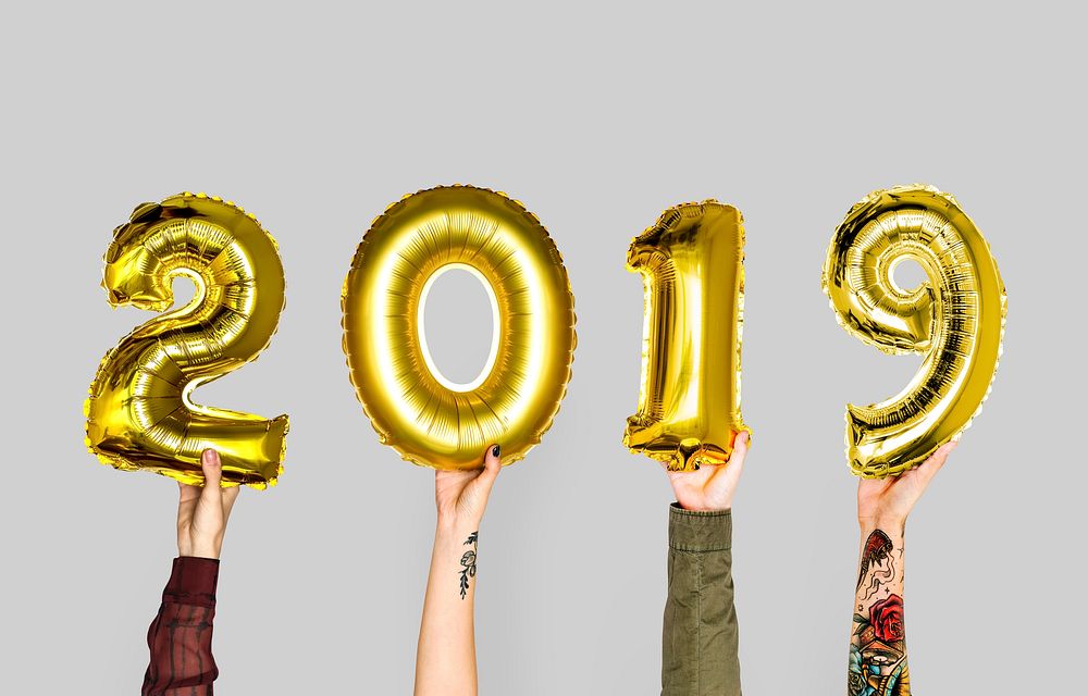 Hand holding new year 2019 balloon