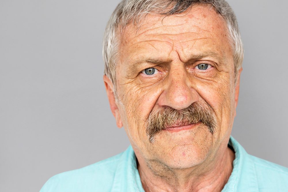 Senior Adult Man Serene Face Expression Studio Portrait