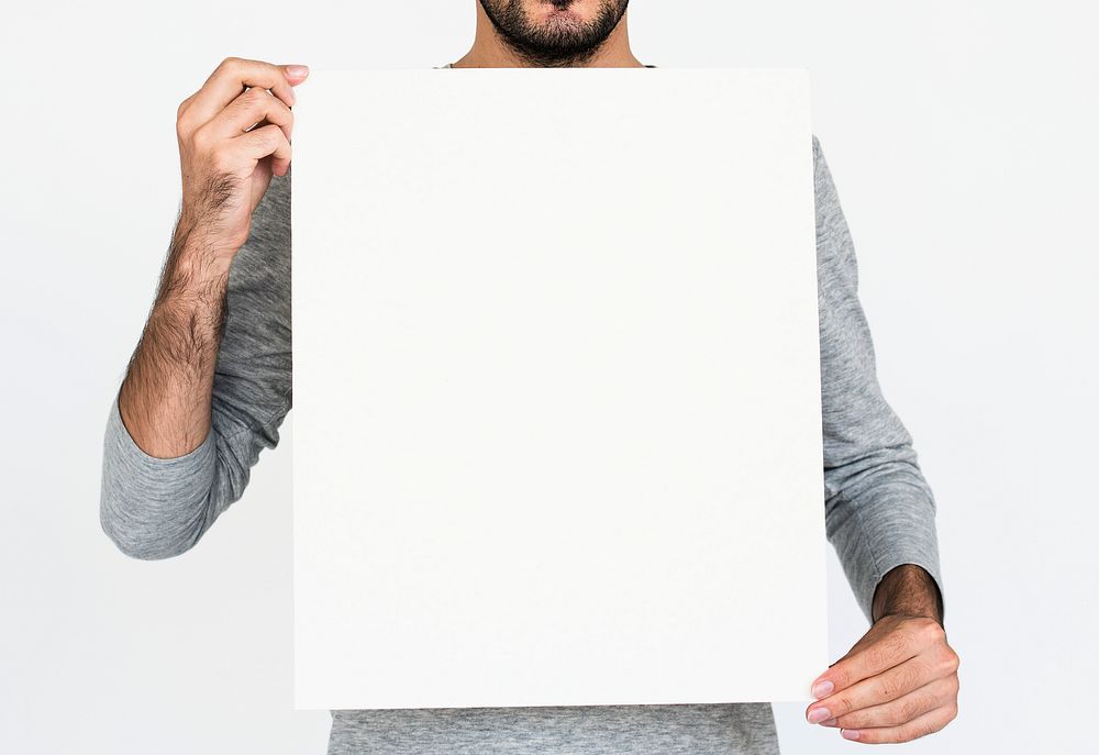 Man holding a blank white board
