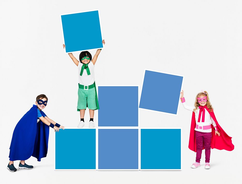 Young superheroes stacking empty boxes