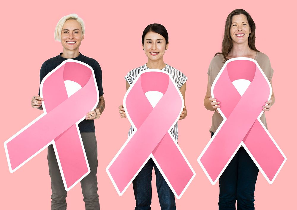 Women holding breast cancer awareness ribbons