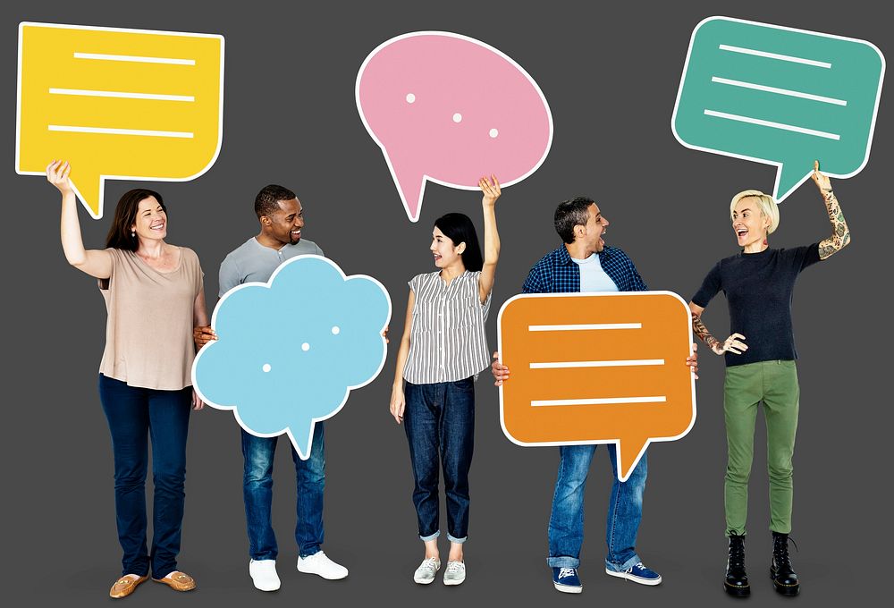 Group of people holding speech bubbles