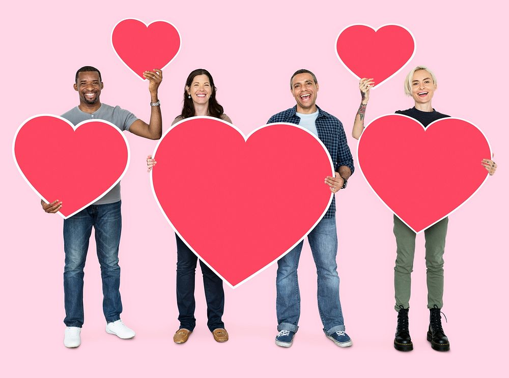 Happy diverse people holding hearts
