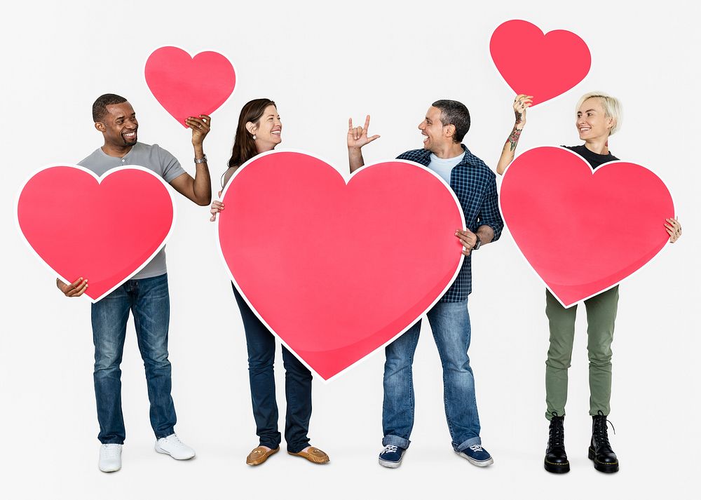 Happy diverse people holding hearts