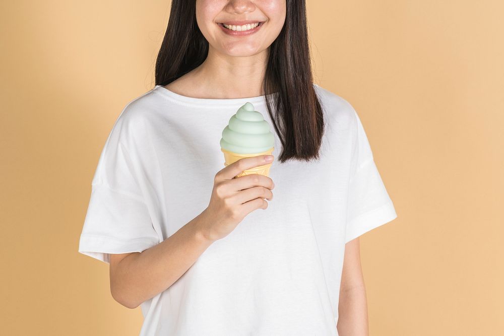 Woman with a soft serve ice cream in her hand