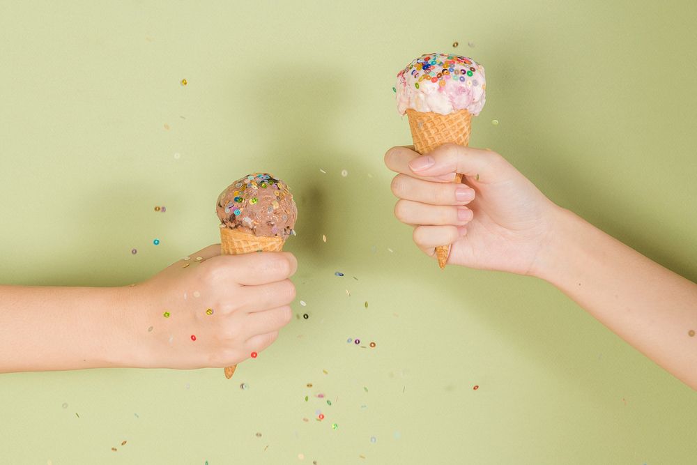 Ice cream cones in the hands