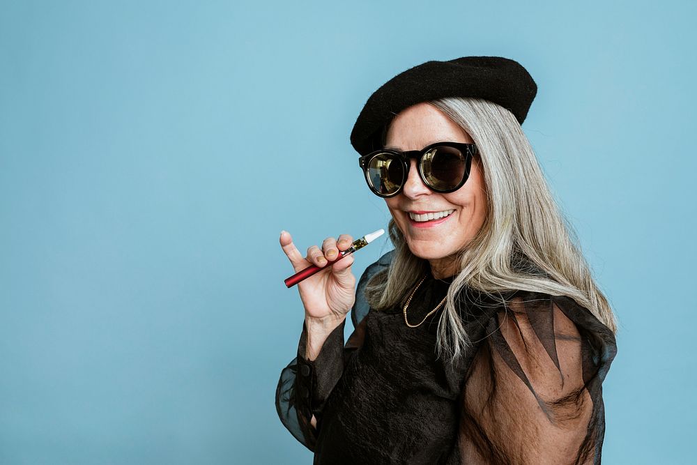 Cool grandma with a vape on blue background