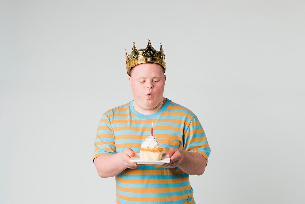 Cool boy with Down Syndrome celebrating his birthday