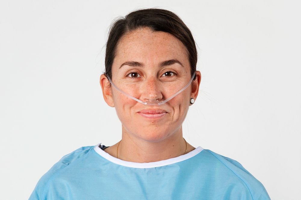 Sick female patient with a nasal cannula