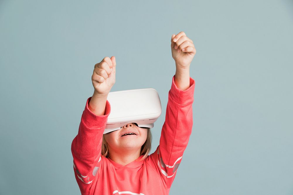 Little girl experiencing a VR headset