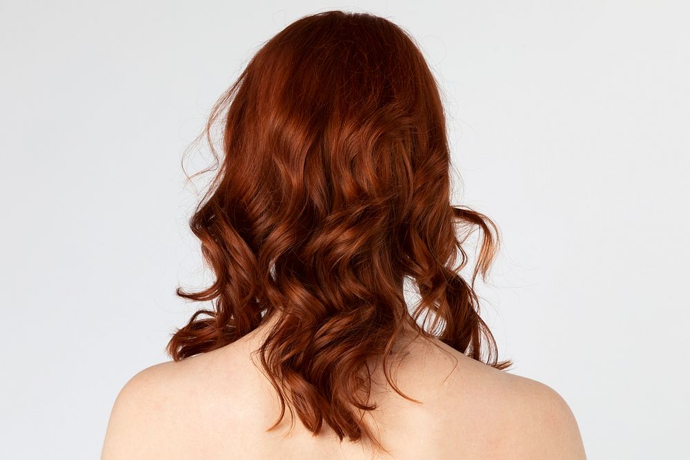 Rear view of a red headed woman 