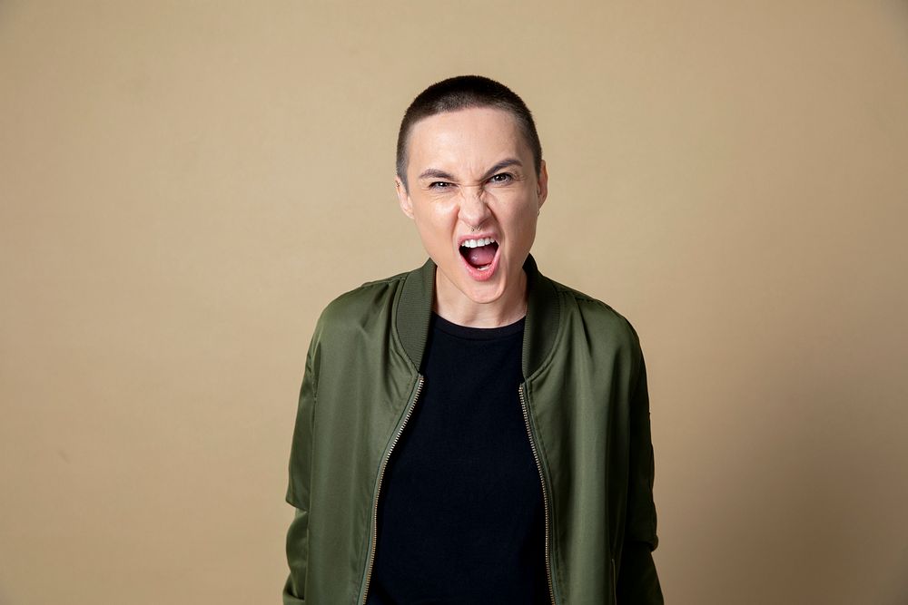 Punk skinhead woman in a studio shoot