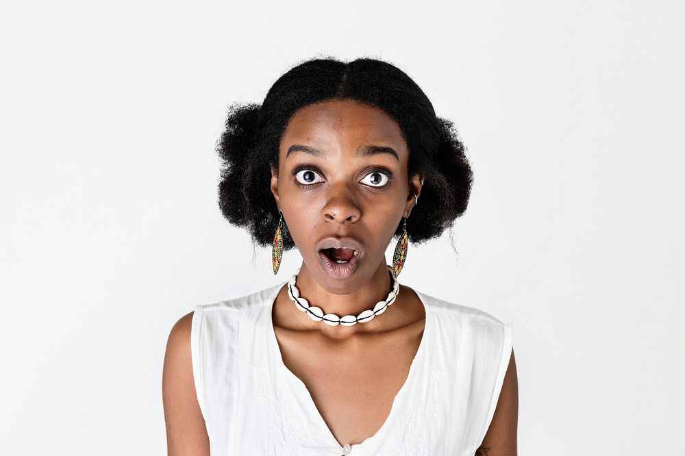 Black woman with a shocked facial expression