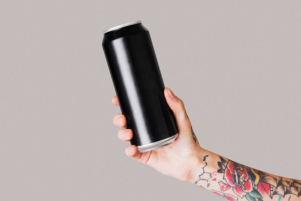 Hand holding a black aluminum can mockup