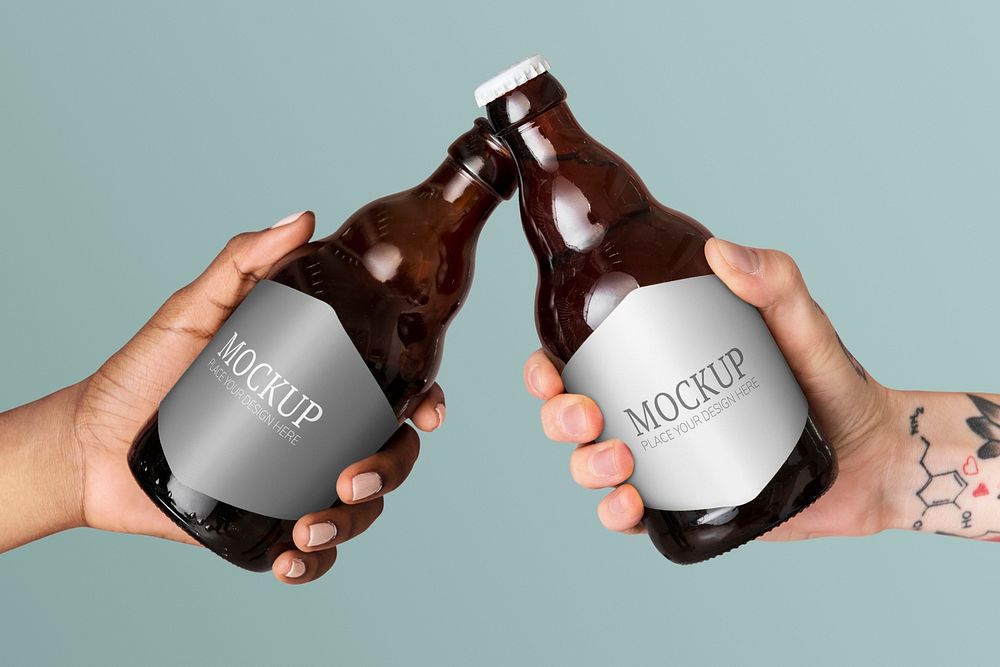 Couple toasting with beer bottles mockup