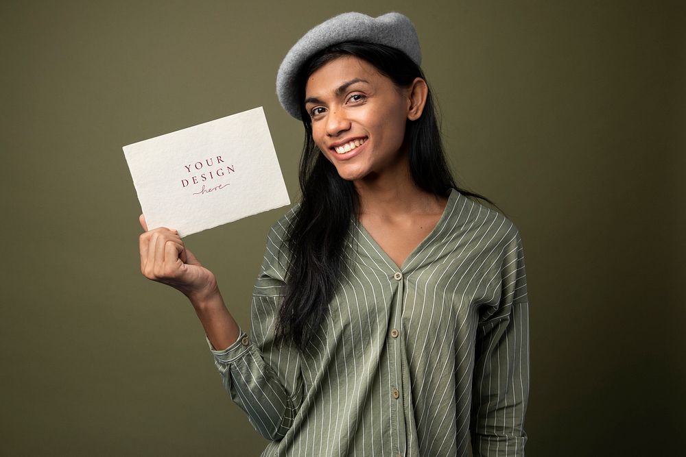 Transgender woman showing an invitation card mockup