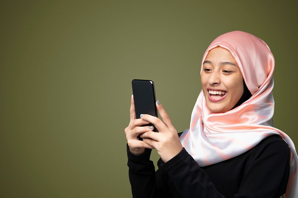 Portraits of a Muslim woman using a mobile phone mockup