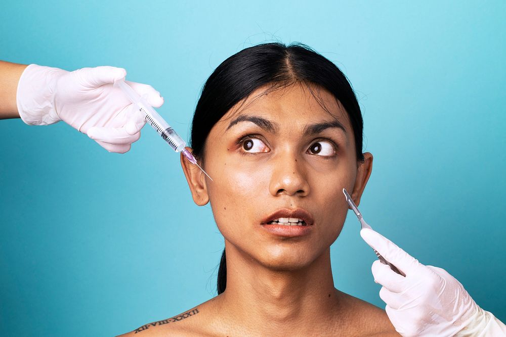 Beautiful woman gets botox injection into her face