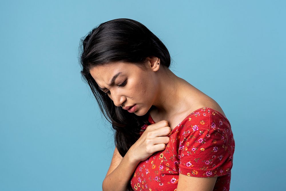 Depressed woman isolated on background