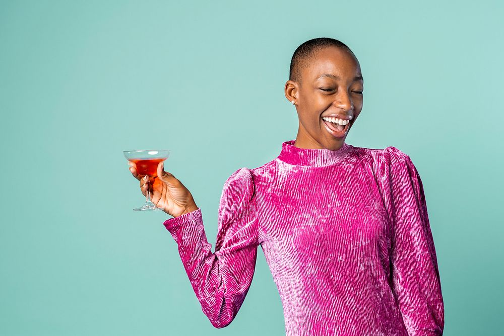 Black woman holding a drink 