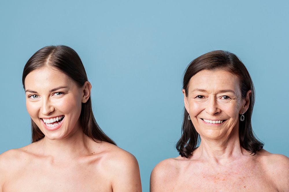 Happy bare chested mother and daughter