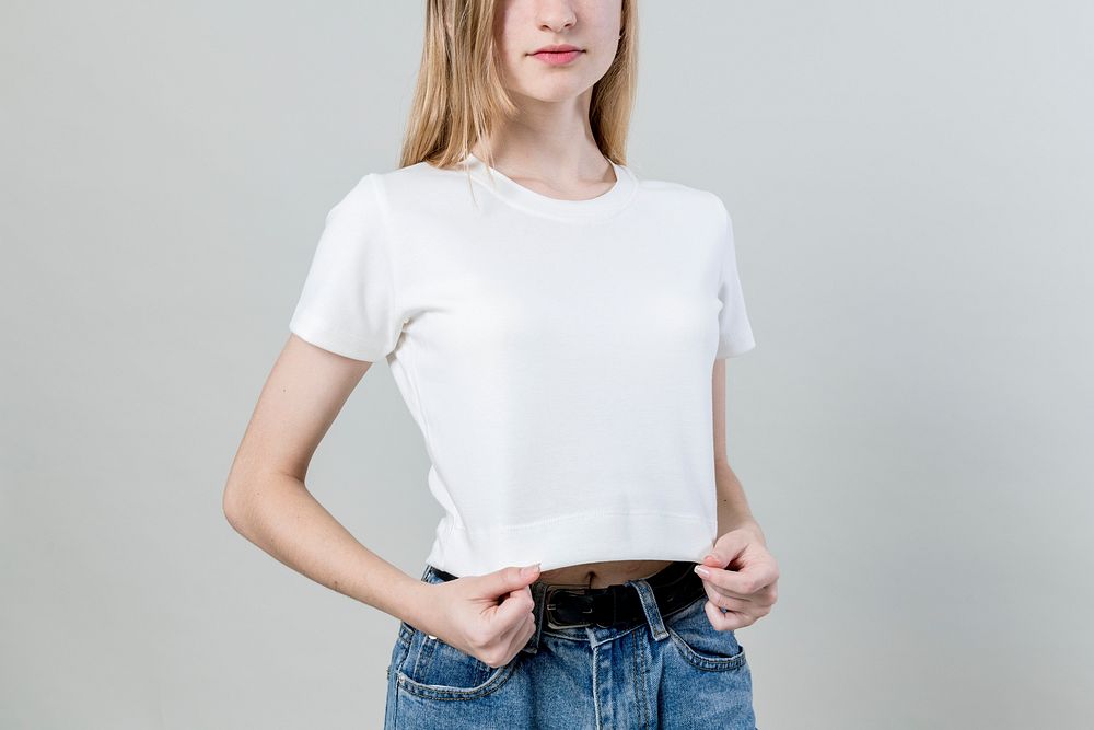 Young blonde girl wearing white t-shirt
