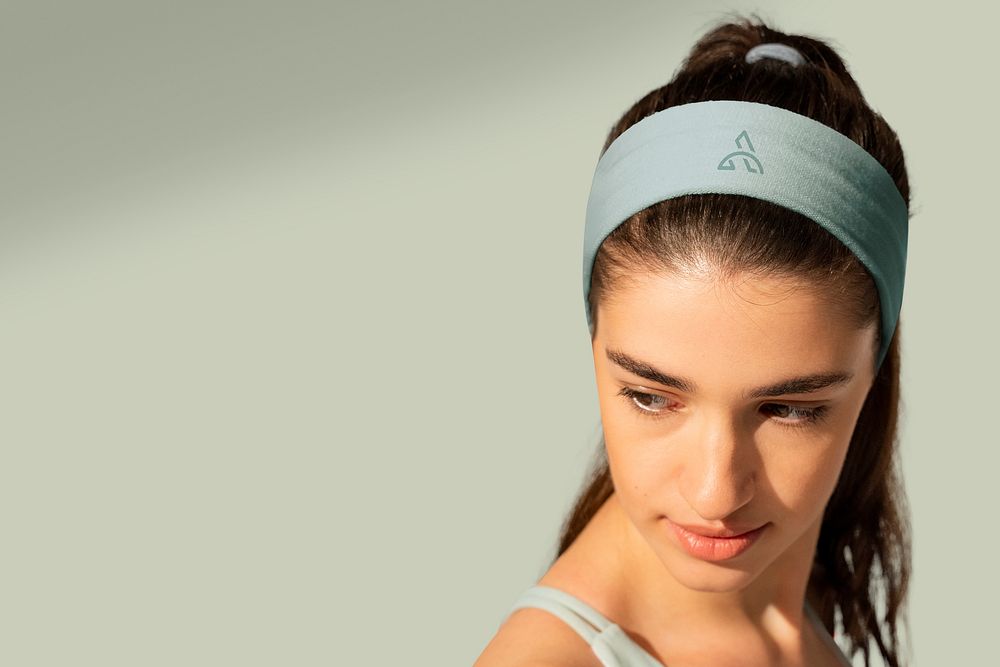Sporty woman in blue headband apparel photoshoot